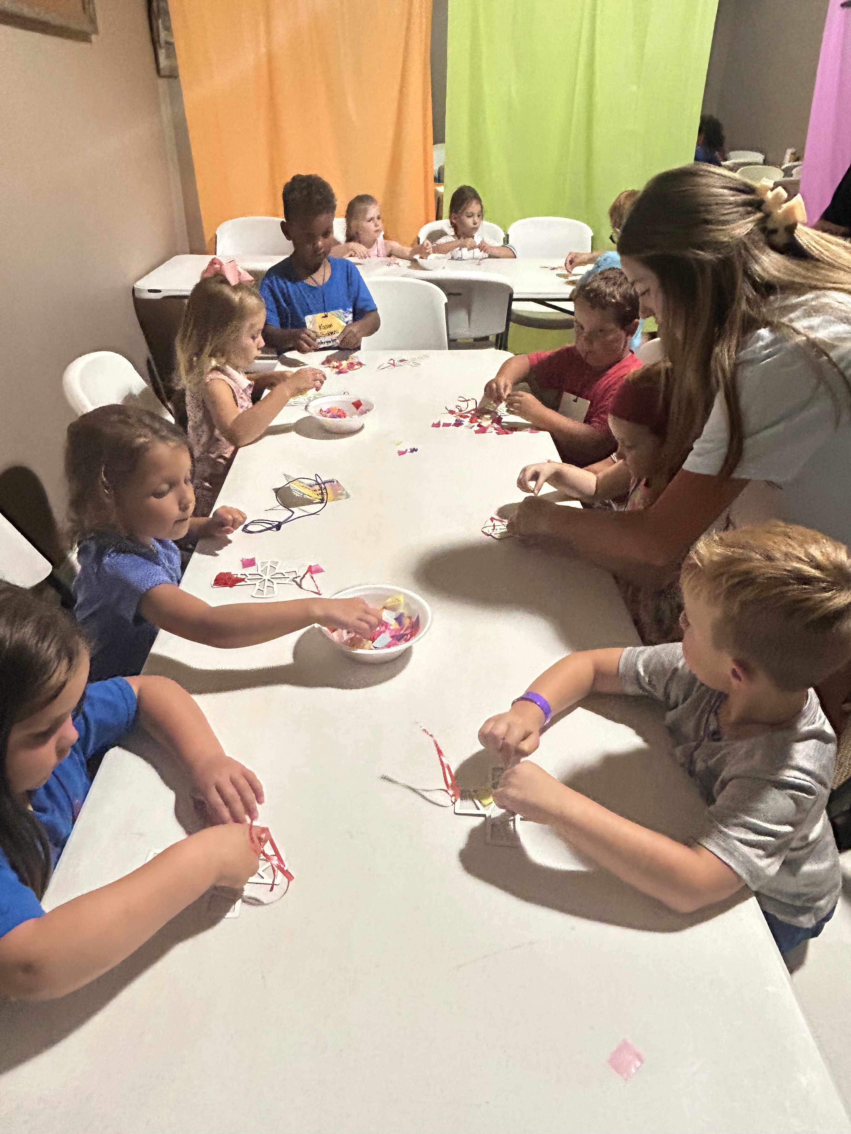 VBS 2026 children and volunteers sharing a fun moment